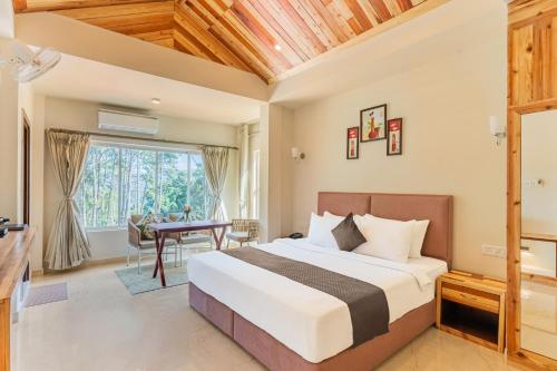 Postel nebo postele na pokoji v ubytování La Nicholas Lake View by Summit Hotels