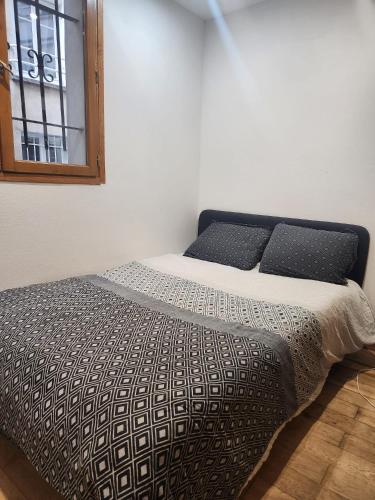 Llit o llits en una habitació de Coqueto Estudio