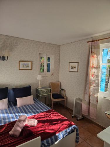 Postel nebo postele na pokoji v ubytování Le Clos du Moulin Dijon , au calme,proche centre ville, la campagne à la ville