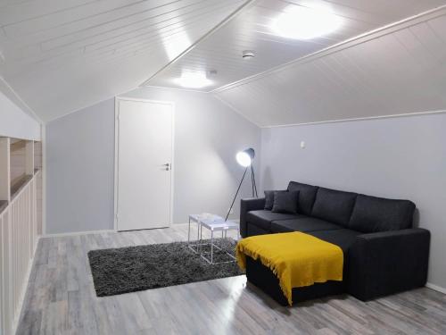 Ein Sitzbereich in der Unterkunft Villa Pinja