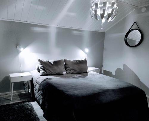 Ein Bett oder Betten in einem Zimmer der Unterkunft Villa Pinja