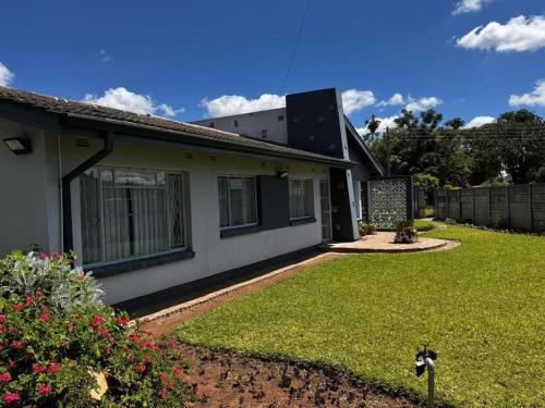 Κήπος έξω από το The house at 68