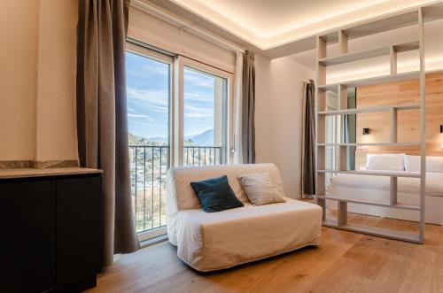 Postel nebo postele na pokoji v ubytování Aosta Holiday Apartments - Rayon