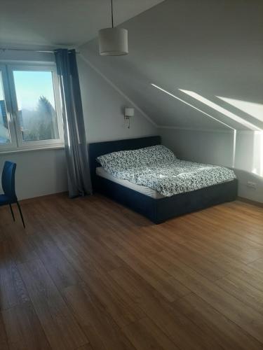 Postel nebo postele na pokoji v ubytování Dom na Beskidzkiej