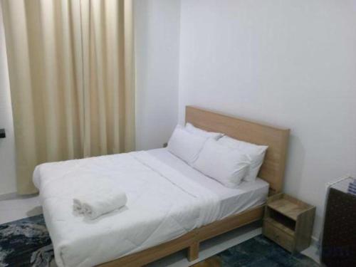 Postel nebo postele na pokoji v ubytování OYO 90976 Pantaistay@baturakit