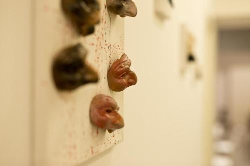 a bunch of food hanging on a wall at Parthenope Suite in Naples
