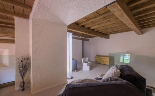 Postel nebo postele na pokoji v ubytování Villa Poggiostelle By Halldis