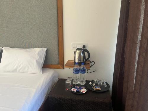 En eller flere senge i et værelse på Vagamon Hill Resort