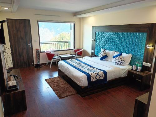 Postel nebo postele na pokoji v ubytování Vue Magique Resort