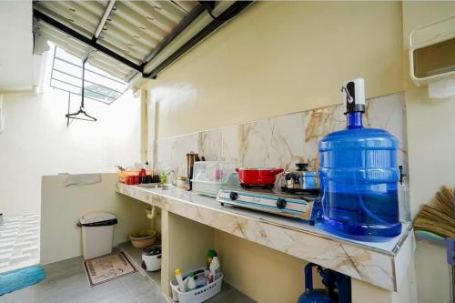 Kuchyň nebo kuchyňský kout v ubytování Happinest Transient Home