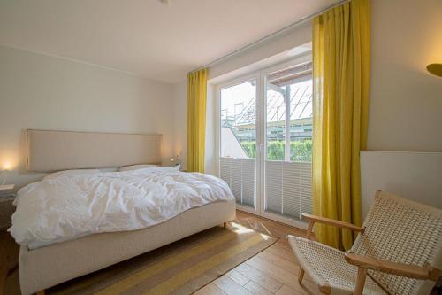 Ένα ή περισσότερα κρεβάτια σε δωμάτιο στο Ferienhaus Gröön Huus