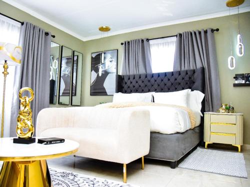 Posezení v ubytování C'est La Vie Guest House