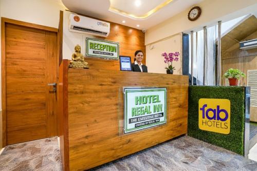 a lobby of a hotel with a reception desk at FabHotel Regal Inn - In Sahar Road in Mumbai