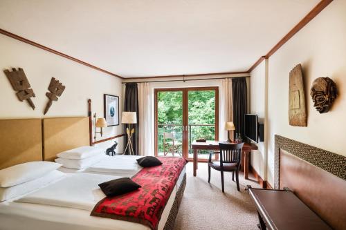 Ένα ή περισσότερα κρεβάτια σε δωμάτιο στο Park-Hotel Hagenbeck