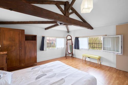 Postel nebo postele na pokoji v ubytování Gite piscine chauffée - Sauvignac