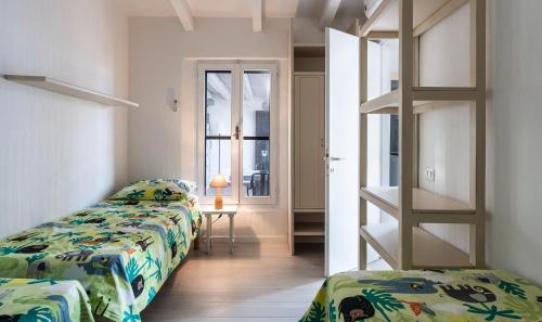 Ένα ή περισσότερα κρεβάτια σε δωμάτιο στο Casa 1