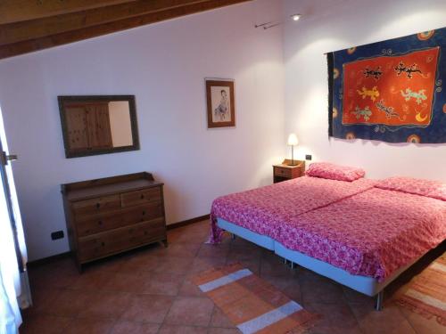 Ένα ή περισσότερα κρεβάτια σε δωμάτιο στο Rosmarino 2