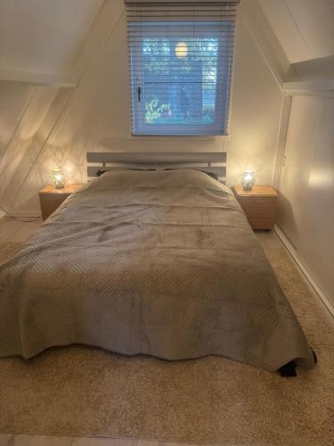 Postel nebo postele na pokoji v ubytování Boshuisje Rekem Charly