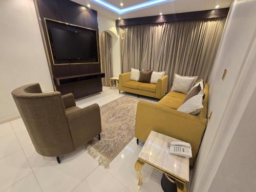 Posezení v ubytování الجوهرة سويت للشقق المخدومة