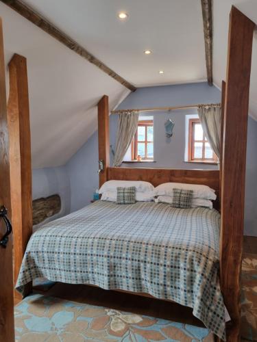 Ένα ή περισσότερα κρεβάτια σε δωμάτιο στο Crug Glas Country House