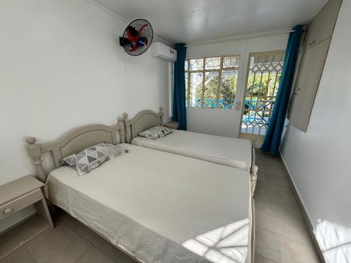 Ένα ή περισσότερα κρεβάτια σε δωμάτιο στο Villa Aquamarine by Lakaz Tropikal