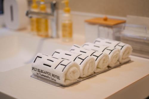 a computer keyboard sitting on top of a counter at Fuji Elegance Hotel in Yamanakako