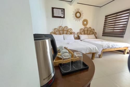 En eller flere senge i et værelse på Salacia Beachfront Resort managed by MA Group