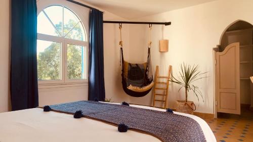 Postel nebo postele na pokoji v ubytování Villa Daba