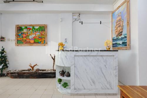 Koupelna v ubytování Shooting Star Hostel Kuta RedPartner - mixed dormitory