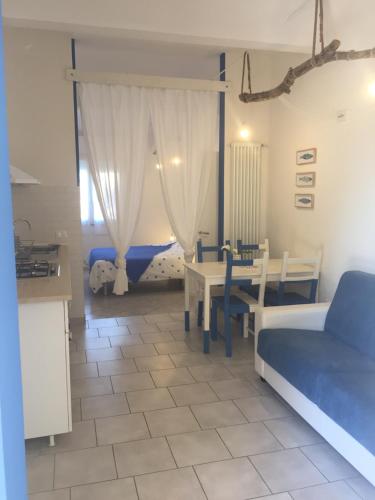 Ένα ή περισσότερα κρεβάτια σε δωμάτιο στο Agriturismo La Contadina Appartamenti