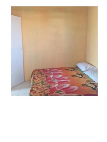 Postel nebo postele na pokoji v ubytování Pousada Rio do Mar