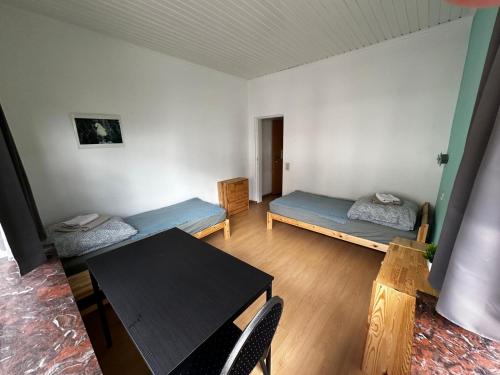 Postel nebo postele na pokoji v ubytování Hotel Grünewald chs