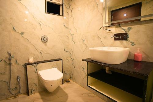 Koupelna v ubytování Hotel Sunrise N Resorts