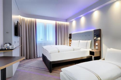 Postel nebo postele na pokoji v ubytování Premier Inn Berlin City Wilmersdorf