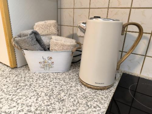 a toaster sitting on a counter in a kitchen at Ferienwohnung - zentral in Vorarlberg in Weiler