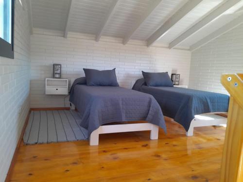 Postel nebo postele na pokoji v ubytování Aire Serrano