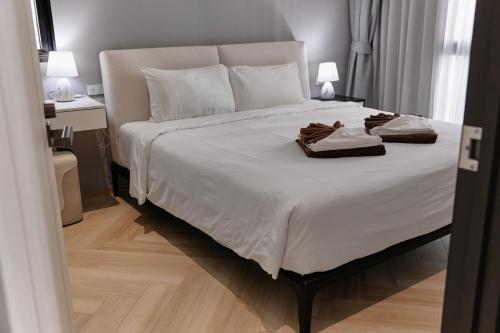 Ένα ή περισσότερα κρεβάτια σε δωμάτιο στο Cute apartment 52 m2 in Brand New condo! BangTao