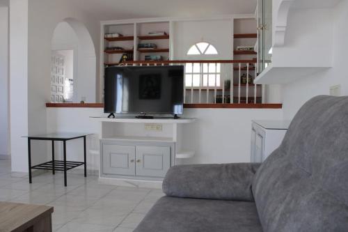 TV a/nebo společenská místnost v ubytování Villa Mercedes Peñoncillo