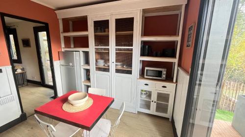 Kuchyň nebo kuchyňský kout v ubytování Les dunes le Lima