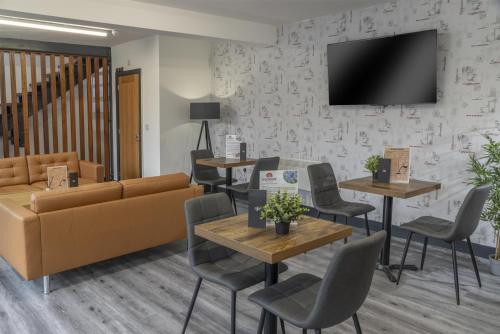 TV/trung tâm giải trí tại Dockside Aparthotel, Best Western Signature Collection