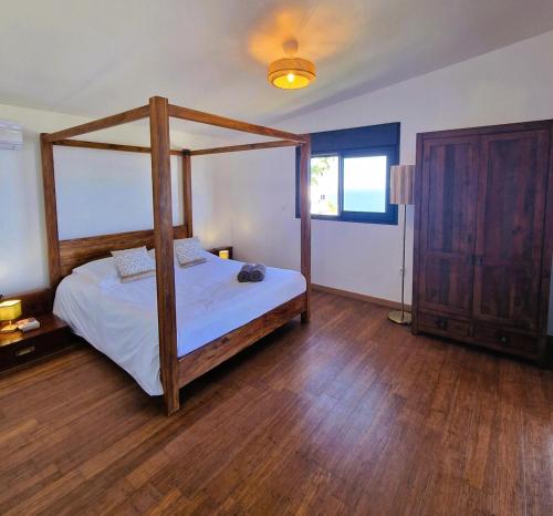 Voodi või voodid majutusasutuse La Case Bleue toas