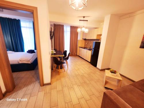 Ένα ή περισσότερα κρεβάτια σε δωμάτιο στο Sea Breeze ApartHotel - Beach Pool & Spa Resort