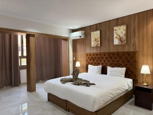 Ένα ή περισσότερα κρεβάτια σε δωμάτιο στο Duplex Menara Mall