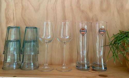 a group of wine glasses sitting on a table at Tiny House The Cabin in Peize