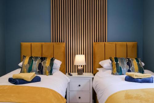 Ένα ή περισσότερα κρεβάτια σε δωμάτιο στο High Street Retreat