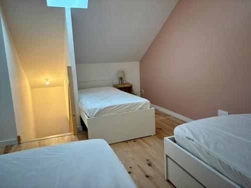 Ein Bett oder Betten in einem Zimmer der Unterkunft Gîte Les Aubracs - Puy de Dôme - Massif du Sancy