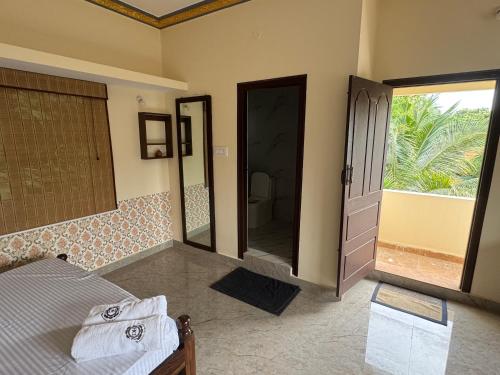 Ένα ή περισσότερα κρεβάτια σε δωμάτιο στο Deva Harmyam