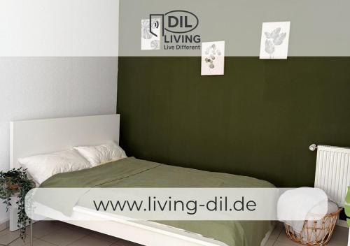 Postel nebo postele na pokoji v ubytování Tropical Room - Self Check In - Bad Nauheim