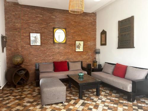 Zona de estar de Ims'Chill Hotel