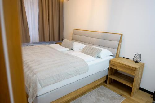 Postel nebo postele na pokoji v ubytování Residence Ali - garage included